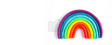 Photo for Banner of a colorful rainbow of plasticine on white background. Made from plasticine. Isolate. - Royalty Free Image