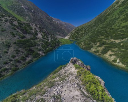 Photo for Lake with clear blue water in the mountains under the sky with clouds in summer - Royalty Free Image