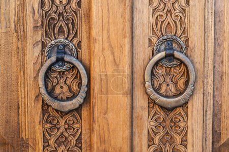 traditional Uzbek Islamic patterns ornament on an wooden carved door in Uzbekistan close-up