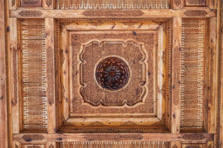 old carved wooden ceiling with oriental uzbec pattern ornament in the Museum of Victims of Political Repression in Tashkent in Uzbekistan