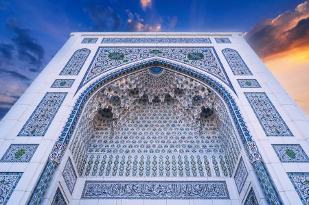 white marble tiles wall decorated traditional Uzbek Islamic pattern ornament on the Minor Mosque in Tashkent in Uzbekistan