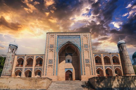 landscape with ancient Uzbek Islamic Kukeldash madrasah in Tashkent in Uzbekistan. Old madrasa in Asia at sunset beautiful sky in summer