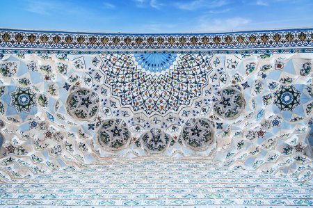 white ceramic tiles decorated traditional Uzbek Islamic pattern ornament on the Masjid Minor Mosque in Tashkent in Uzbekistan