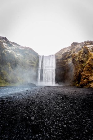 Vertical photo of Skogafoss with empty space black and white, Iceland