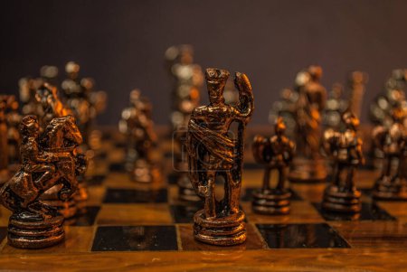 Photo for Chess photographed on a chessboard , play chess, chess scene, king with knight on battle chess - Royalty Free Image