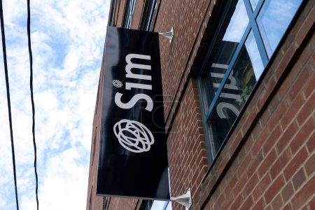 Photo for Toronto, Canada - November 9, 2020: Sim International company sign is seen in Toronto on November 9, 2020. Sim is a supplier of production equipment, workflow/dailies and post-production solutions. - Royalty Free Image
