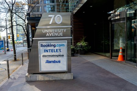 Photo for Toronto, Canada - November 9, 2020: Company sign for Booking.com, Intelex, dermalogica and Rambus on the directory sign at 70 University Ave. in Toronto, Canada. - Royalty Free Image