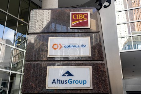 Photo for Toronto, Canada - October 28, 2020: A directory signage with company signs for CIBC, optimus sbr, Altus Group and GWL realty Advisors outside the office building on 33 Yonge St. in Toronto, Canada. - Royalty Free Image