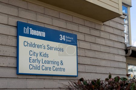 Photo for Toronto, Canada - November 28, 2020: A sign for children's services and City Kids Early Learning and Child Care Centre is seen on Bathurst St. in Toronto. - Royalty Free Image