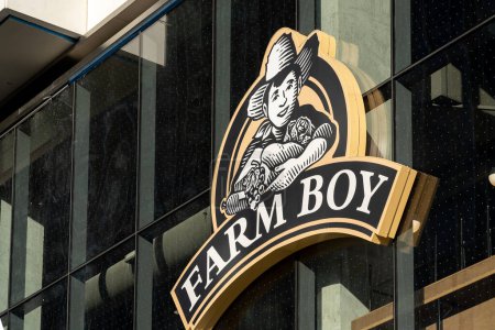 Photo for Toronto, Canada - November 19, 2020: Close-up of Farm Boy store sign in Toronto, Canada. Farm Boy Inc. is a Canadian food retailer operating in the province of Ontario. - Royalty Free Image