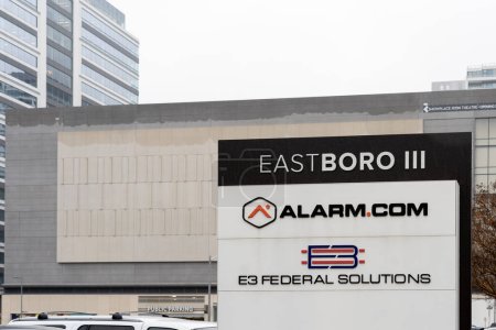 Photo for Tysons Corner, Virginia, USA- March 1, 2020: Alarm.com sign at their headquarters in Tysons Corner, Virginia, USA. Alarm.com, Inc is an American technology company that provides cloud based services. - Royalty Free Image