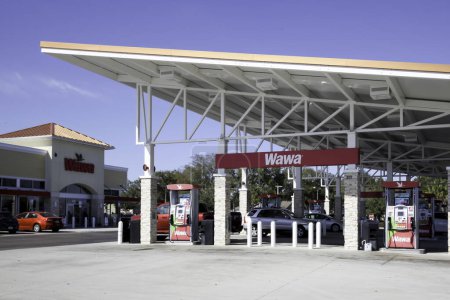Photo for Orlando, Florida, USA - January 21, 2020: Wawa gas station with the store in Orlando, Florida, USA. Wawa, Inc is an American chain of convenience stores and gas stations. - Royalty Free Image