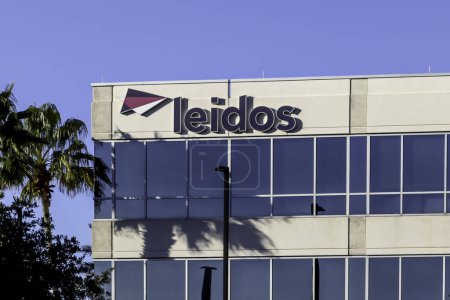 Photo for Orlando, Florida, USA - February 8, 2020: Leidos sign at the office building in Orlando, Florida, USA. Leidos is an American defense, aviation, information technology, and biomedical research company. - Royalty Free Image