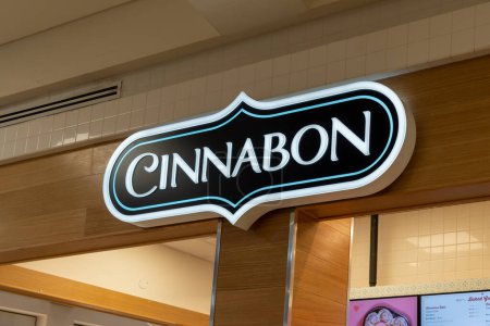 Photo for Tysons Corner, Virginia, USA- January 14, 2020: Sign of Cinnabon in Tysons Corner Center, Virginia, USA. Cinnabon is an American chain of baked goods stores and kiosks. - Royalty Free Image