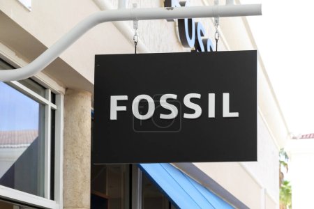 Photo for Orlando, Florida, USA - February 24, 2020: Fossil store hanging sign outside of the store in Orlando, Florida, USA. Fossil Group, Inc. is an American fashion designer and manufacturer. - Royalty Free Image