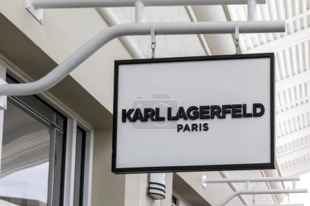 Photo for Orlando, Florida, USA - February 24, 2020: Karl Lagerfeld Paris hanging sign outside the store in Orlando, Florida, USA. Karl Lagerfeld was a German fashion designer. - Royalty Free Image