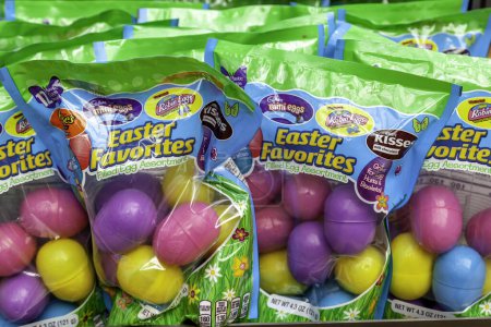 Photo for Pennsylvania, New York, USA - March 2, 2020: Many bags of Hersheys filled plastic eggs for Easter egg hunts. Hershey is an American company and one of the largest chocolate manufacturers in the world - Royalty Free Image