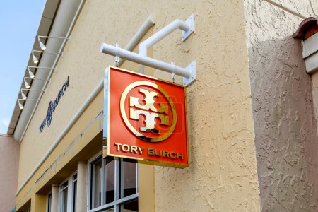 Photo for Orlando, Florida, USA- February 24, 2020: Tory Burch hanging sign outside the store in Orlando, Florida, USA. Tory Burch LLC is an American fashion label. - Royalty Free Image