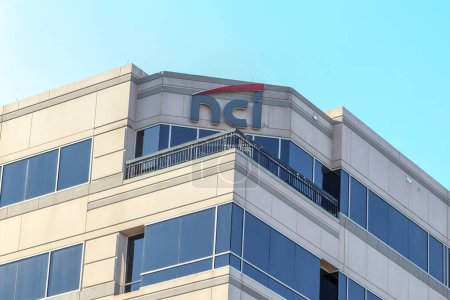 Photo for Reston, Virginia, USA - March 1, 2020: NCI sign on the office building in Reston, Virginia, USA. NCI is an American diversified IT and professional services company. - Royalty Free Image