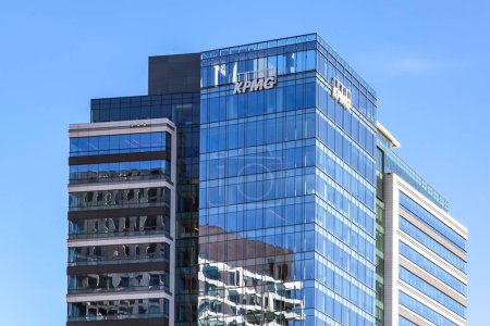 Photo for Tysons Corner, Virginia, USA- March 1, 2020: Sign of KPMG on the building in Tysons Corner, Virginia, USA. KPMG is a professional service company and one of the Big Four auditors, Seated in Netherland - Royalty Free Image