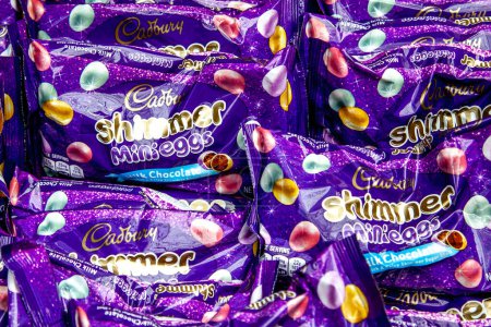 Photo for Pennsylvania, New York, USA - March 2, 2020: Hershey's Easter Cadbury Shimmer Mini Eggs bags on the shelf in a store. Hershey is an American chocolate manufacturer - Royalty Free Image