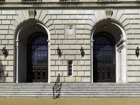 Photo for Washington D.C., USA - March 1, 2020: One of the entrance to United States Internal Revenue Service (IRS) headquarters building in Washington, D.C. USA. - Royalty Free Image