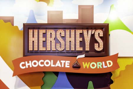 Photo for Pennsylvania, New York, USA - March 2, 2020: Hersheys Chocolate World sign inside the store in Pennsylvania. Hershey is an American company and one of the largest chocolate manufacturers in the world - Royalty Free Image