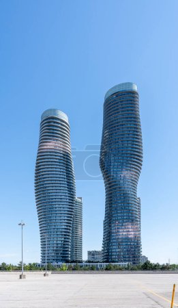Photo for Mississauga, Ontario, Canada - July 14, 2019: Marilyn Monroe towers in Mississauga, Ontario, Canada. Marilyn Monroe towers are Residential condominiums. - Royalty Free Image