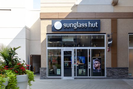 Photo for Sunglass Hut store sign is seen in Niagara-on-the-Lake, On, Canada on September 10, 2019. Sunglass Hut is an American retailer of sunglasses and sunglass accessories. - Royalty Free Image
