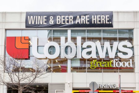 Photo for TORONTO, CANADA - JANUARY 9, 2018: Loblaws store sign. Loblaw is offering customers a $25 gift card after admitting the company participated in an industry-wide bread price-fixing arrangement. - Royalty Free Image