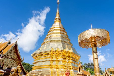 Photo for Roof of the central golden stupa with blue sky in background at Wat Phra That Doi Suthep, Chiang Mai, Thailand, a Theravada Buddhist temple (wat) in Chiang Mai Province - Royalty Free Image