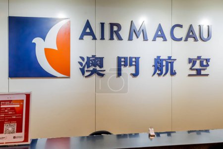 Téléchargez les photos : Taoyuan, Taiwan- 20 novembre 2018 : Une compagnie aérienne Air Macao signe au comptoir de l'aéroport international de Taoyuan près de Taipei. - en image libre de droit