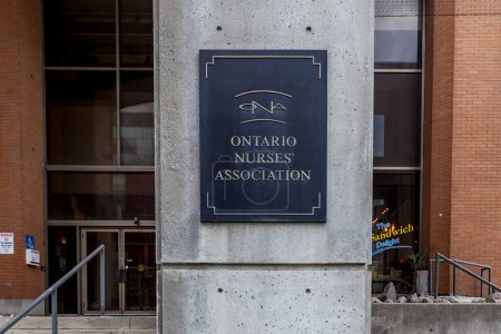 Photo for Toronto, Canada - November 20, 2020: A close up sign for Ontario Nurses Association (ONA) in Toronto. Ontario Nurses Association (ONA) is the trade union that represents 60,000 registered nurses. - Royalty Free Image