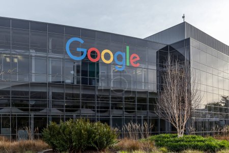 Photo for Mountain View, California, USA - March 28, 2018: Google sign on the building at Google's headquarters in Googleplex. Google is an American technology company in Internet-related services and products. - Royalty Free Image