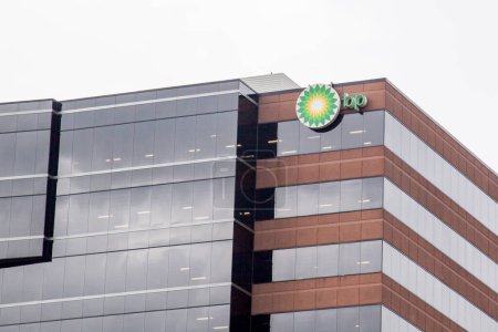 Photo for Houston, Texas, USA - September 22, 2018: Sign and logo of BP at United States head office in Houston, US. BP plc is a British multinational oil and gas company headquartered in London, England. - Royalty Free Image