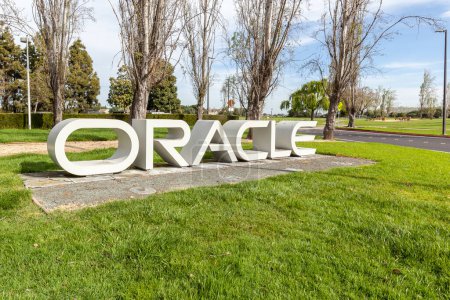 Photo for Redwood Shores, California, USA - March 30, 2018: Oracle sign at Oracle 's headquarters in Silicon Valley. Oracle Corporation is an American multinational computer technology corporation. - Royalty Free Image