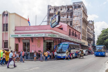 Photo for Havana Cuba - April 17, 2017: Tourists visit the famous Ernest Hemingway cafe "Floridita" in Havana, Cuba. - Royalty Free Image
