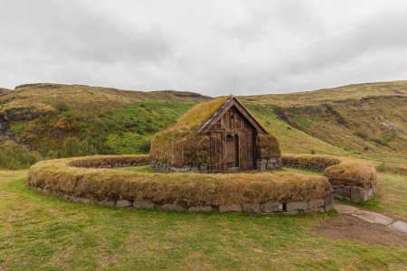Photo for Turf church in Commonwealth farm, based on the ruins of the former manor farm, Stng in jrsrdalur which is considered to have been abandoned after its destruction in the Hekla eruption of the 1104 - Royalty Free Image