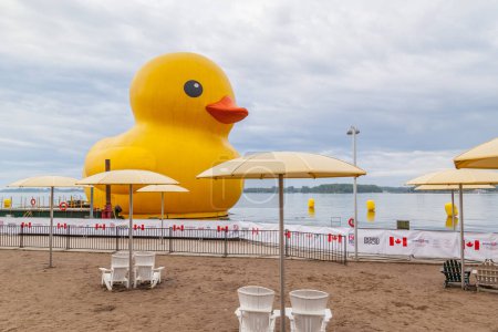 Photo for TORONTO, CANADA - JULY 1, 2017: The World's Largest Rubber Duck in Toronto Harbor for Canada Day, the 6 story tall duck is 78 feet wide and 89 feet long and weighs in at 30,000 lbs. - Royalty Free Image