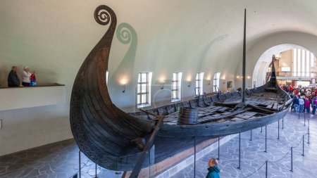 Photo for OSLO, NORWAY - MAY 13, 2016: People visit Viking Ship Museum in Oslo Norway. - Royalty Free Image