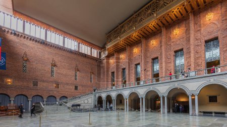 Photo for STOCKHOLM, SWEDEN - MAY 21, 2016: People are in inside of the Stockholm City Hall on May 21, 2016. The City Hall is the venue of the Nobel Prize banquet. - Royalty Free Image