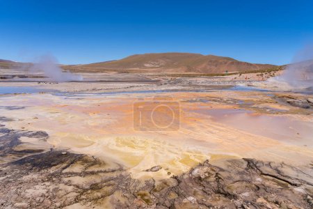 View of El Tatio, Chile. El Tatio is a geothermal field with many geysers near the town of San Pedro de Atacama in the Andes Mountains of northern Chile.