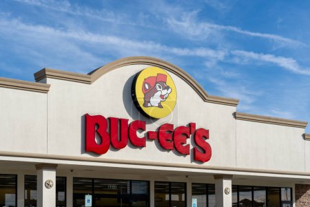 Photo for Houston, Texas, USA - February 14, 2022: Closeup of Buc-ee's sign on the building with blue sky in background. Buc-ee's is a chain of travel centers. - Royalty Free Image