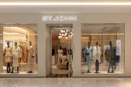 Photo for Houston, Texas, USA - February 25, 2022: St. John store in a shopping mall. St. John, is a luxury American fashion brand that specializes in women's knitwear - Royalty Free Image