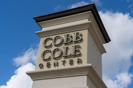 Photo for Daytona Beach, Florida, USA - January 13, 2022: Cobb Cole Center closeup sign is shown in Daytona Beach, Florida, USA. Cobb Cole Center is a 7-story low-rise building. - Royalty Free Image