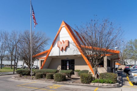 Photo for Pearland, TX, USA - March 10, 2022: A Whataburger restaurant in Pearland, TX, USA. Whataburger is an American regional fast food restaurant chain that specializes in hamburgers. - Royalty Free Image