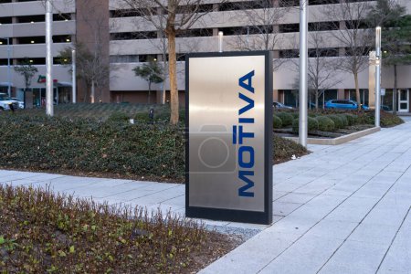 Photo for Houston, TX, USA - February 27, 2022: Motiva company logo sign at its headquarters in Houston. Motiva Enterprises, LLC, is an American company that operates as a fully-owned affiliate of Saudi Aramco. - Royalty Free Image