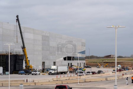 Photo for Austin, Texas, USA - March 17, 2022: Tesla Car factory under construction site is shown in Austin, Texas, USA. Tesla, Inc. is an American automotive and clean energy company. - Royalty Free Image