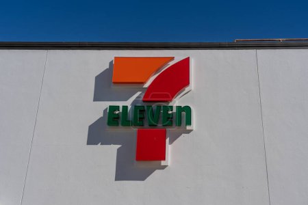 Photo for Houston, Texas, USA - March 13, 2022: 7-Eleven logo sign on the wall is shown at one of their stores in Houston. 7-Eleven, Inc. is an American multinational chain of retail convenience stores. - Royalty Free Image