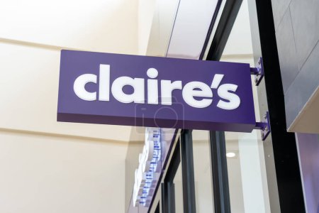 Photo for Houston, Texas, USA - March 6, 2022: Claire's store projecting sign at a shopping mall in Houston, Texas, USA. Claire's is an American retailer of accessories, jewelry, and toys. - Royalty Free Image